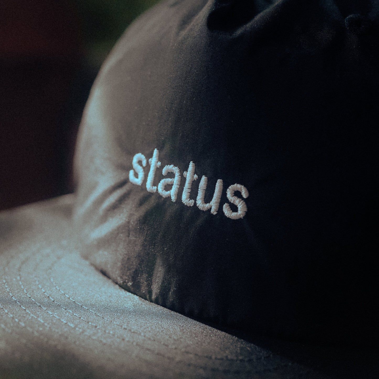 "Status" Cap